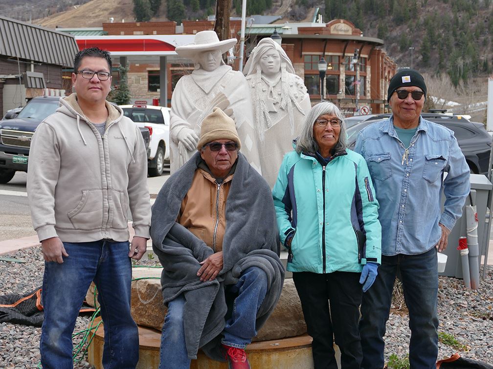 Ute artist with family after the installation of the Bear Dancers